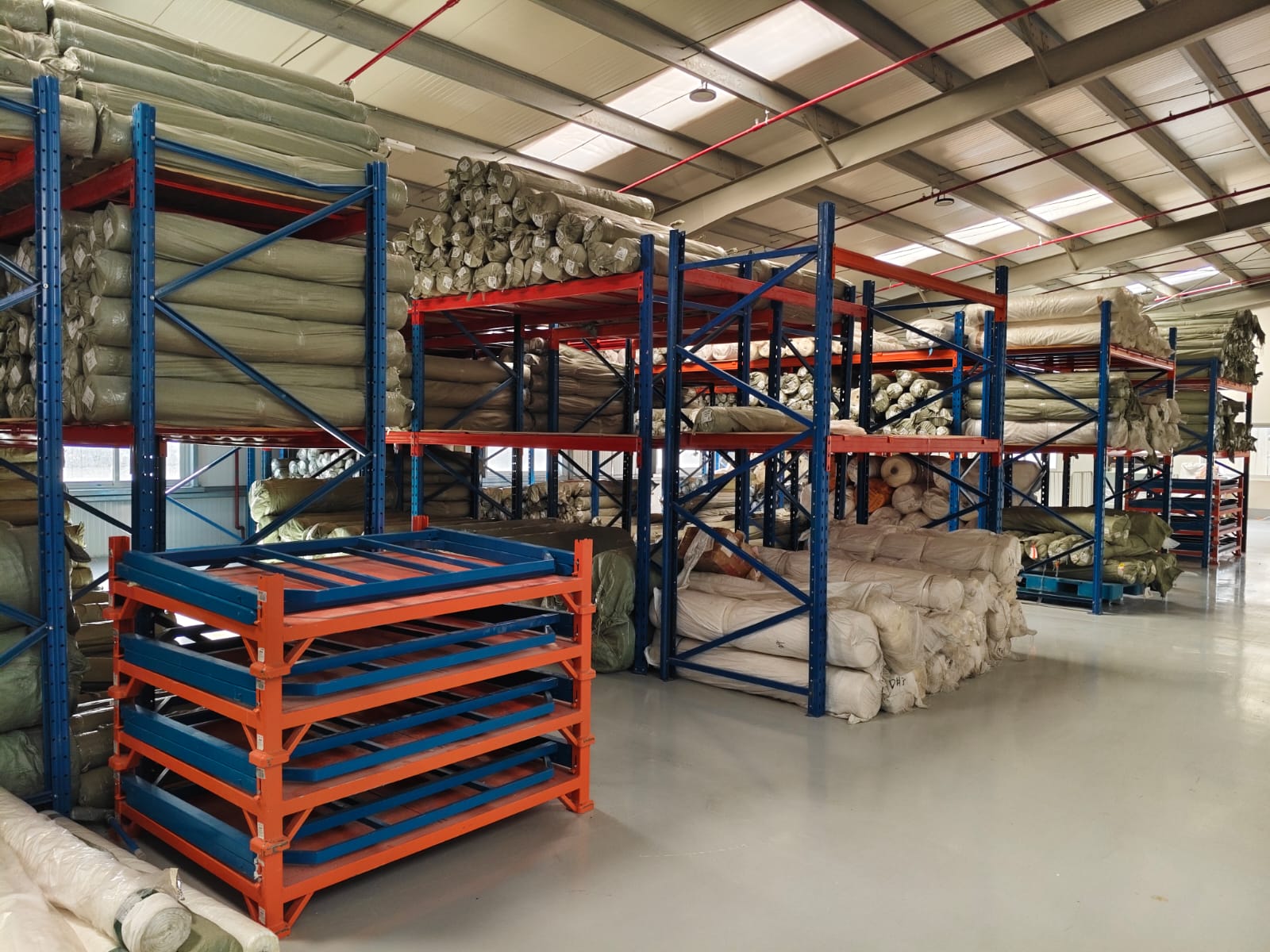 Our fabric warehouse stocked with rolls